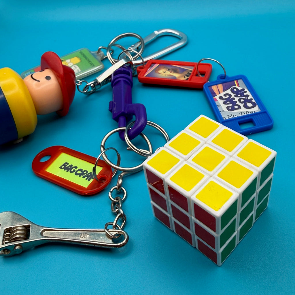 One-of-One 90s Vintage Keychain Bag Charm Pack — Fireman, Wrench, Bart Simpson