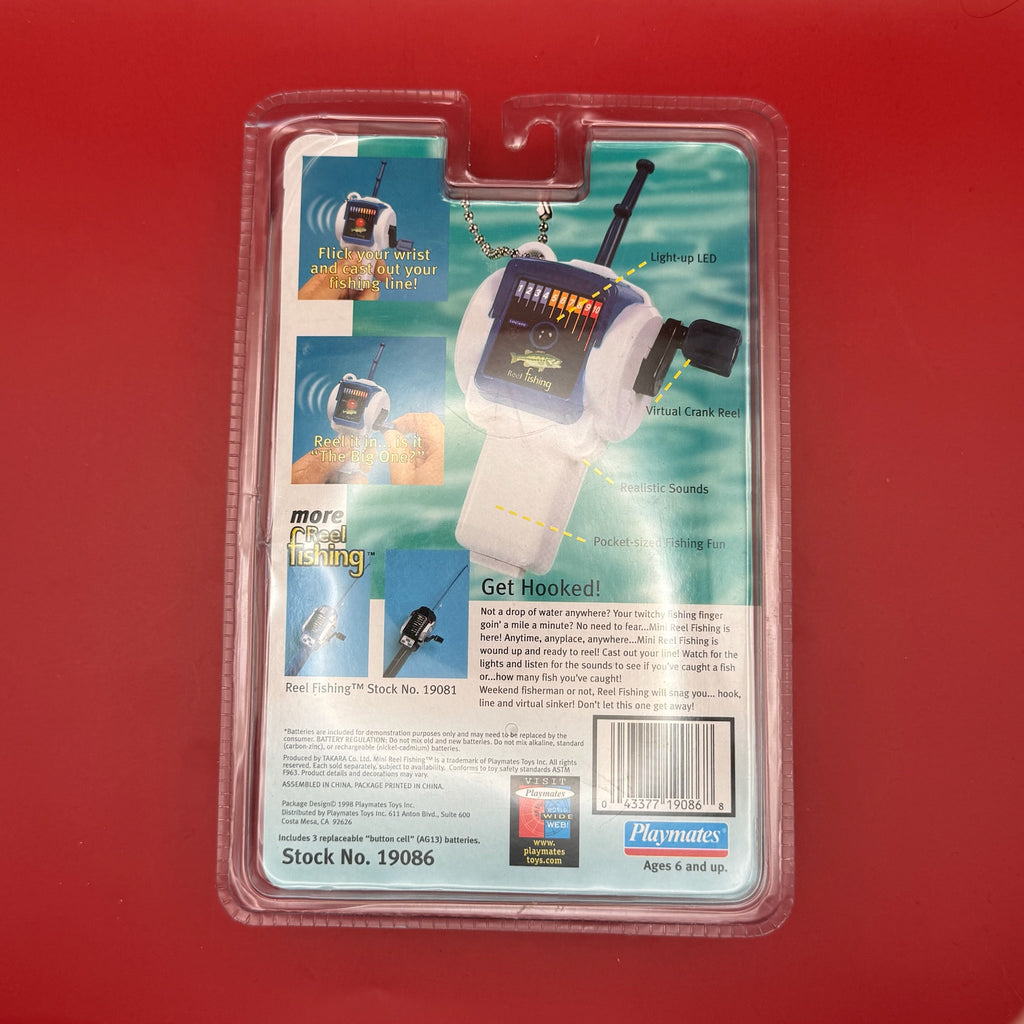 RARE NIB 1998 Mini Reel Fishing Vintage Keychain