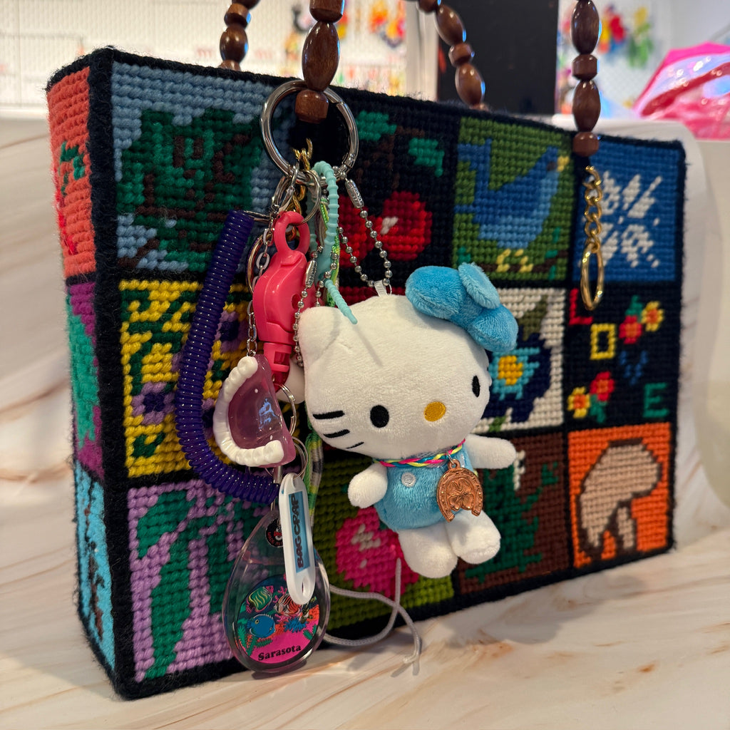 Vintage Blue Hello Kitty Plushie and Purple Plastic Teeth Keychain and Bag Charm Pack