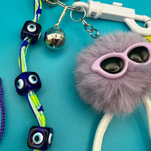 Purple Pom Pom Evil Eye   Pack - vintage bag charm packs nostalgia vintage y2k vintage keychain vintage charms for bag nostalgia vintage keychains y2k collectible - Bag Crap
