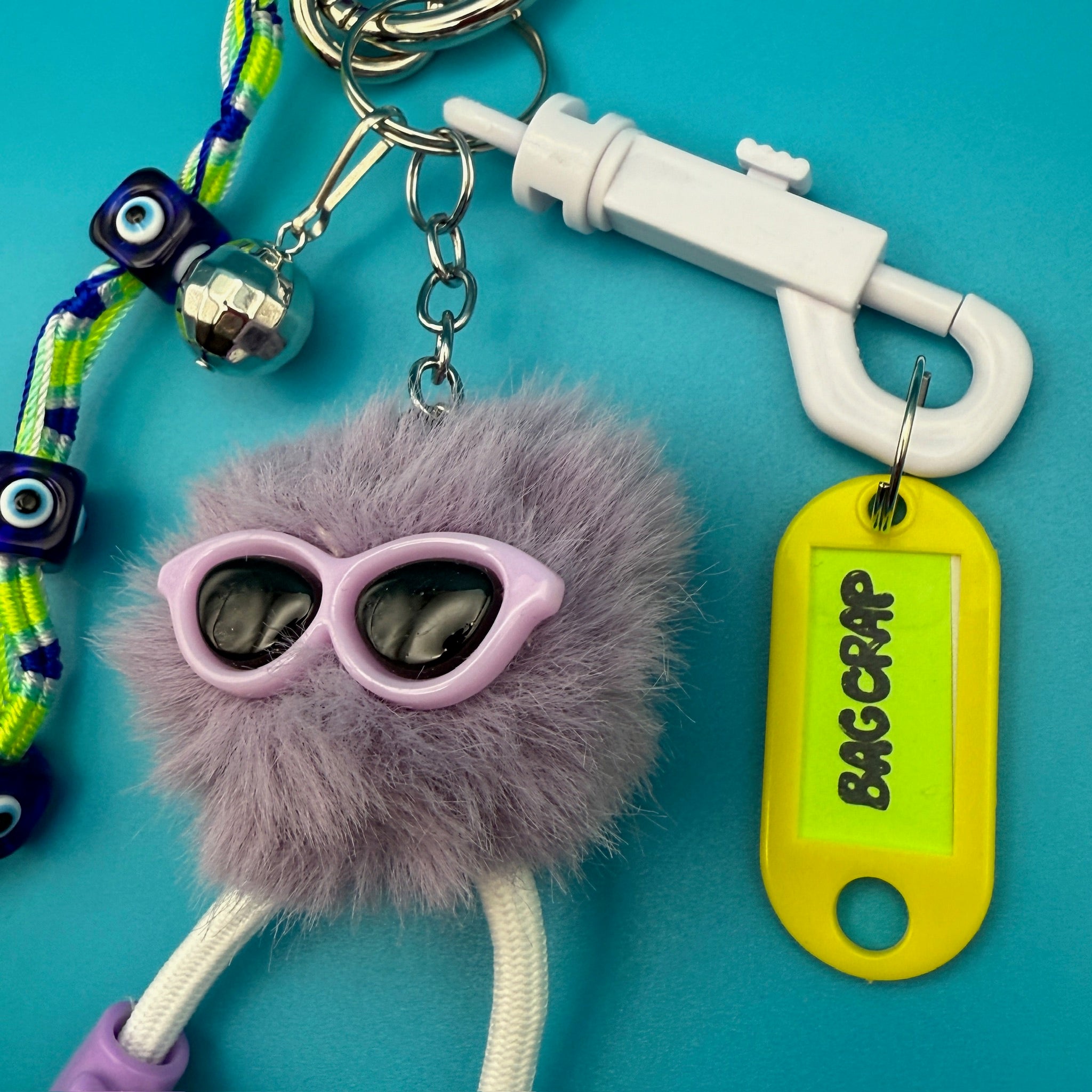 Purple Pom Pom Evil Eye   Pack - vintage bag charm packs nostalgia vintage y2k vintage keychain vintage charms for bag nostalgia vintage keychains y2k collectible - Bag Crap