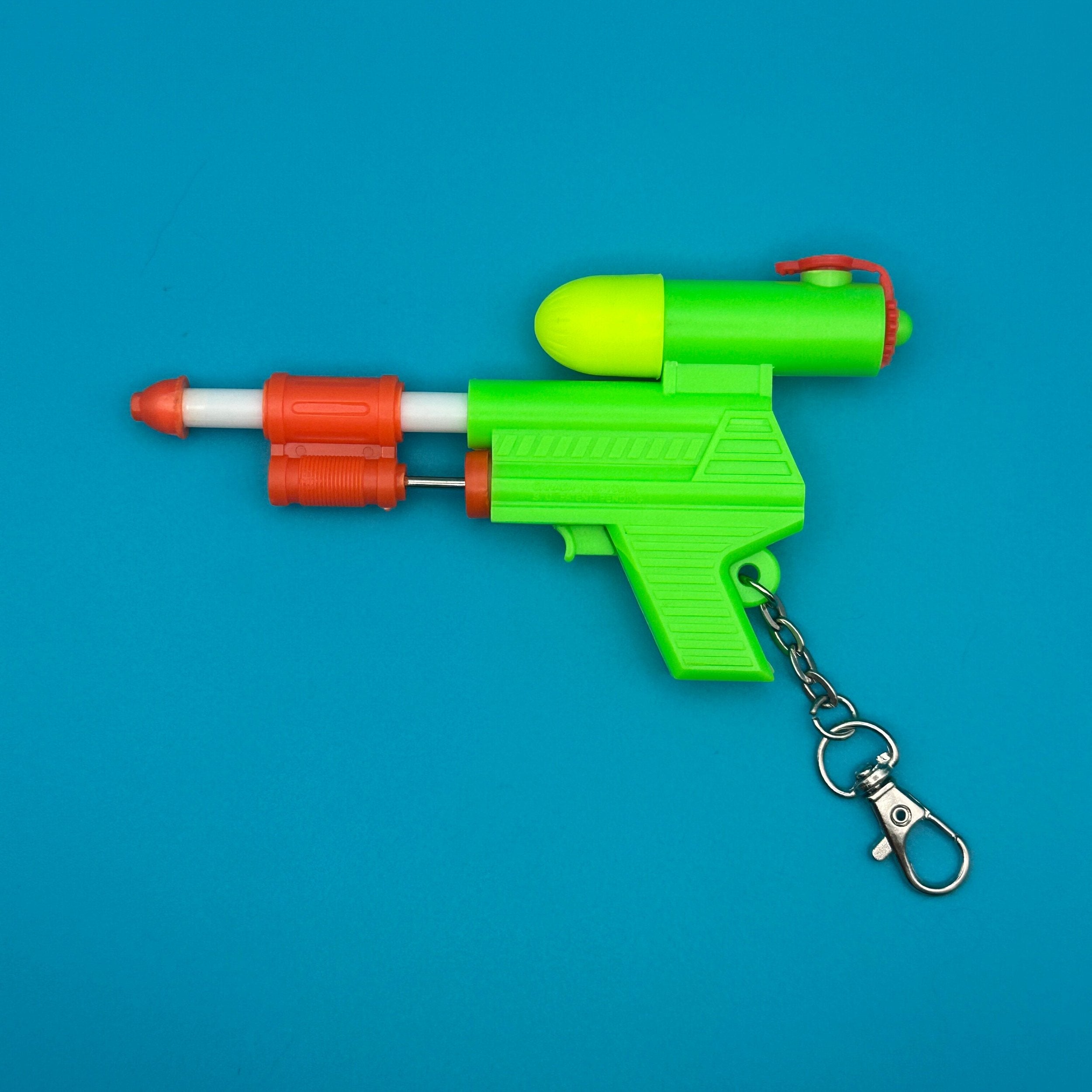 90's Deadstock Neon 'Super Soaker' Squirt Gun    s -  vintage keychain vintage charms for bag nostalgia vintage keychains y2k collectible - Bag Crap