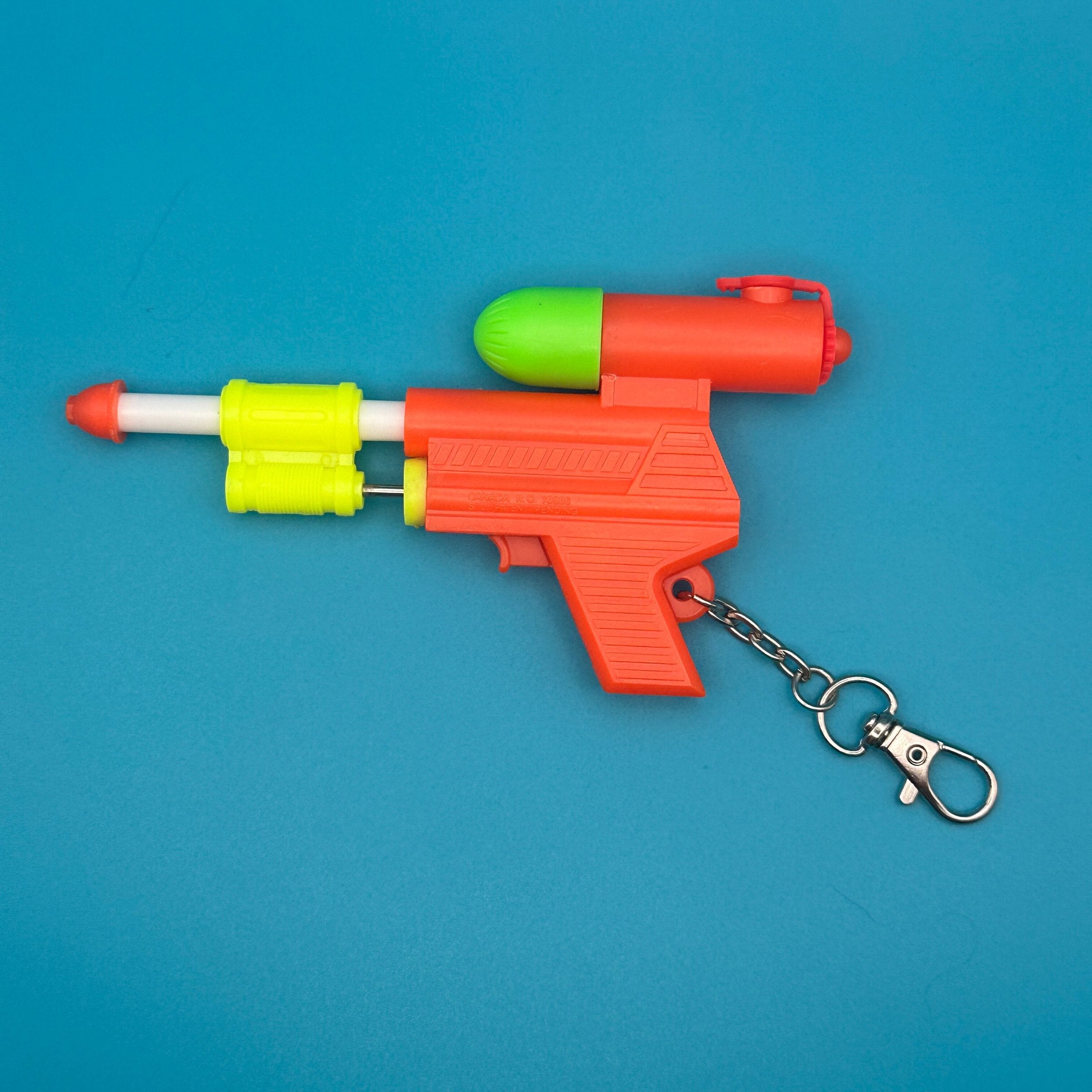 90's Deadstock Neon 'Super Soaker' Squirt Gun Vintage Keychain Bag