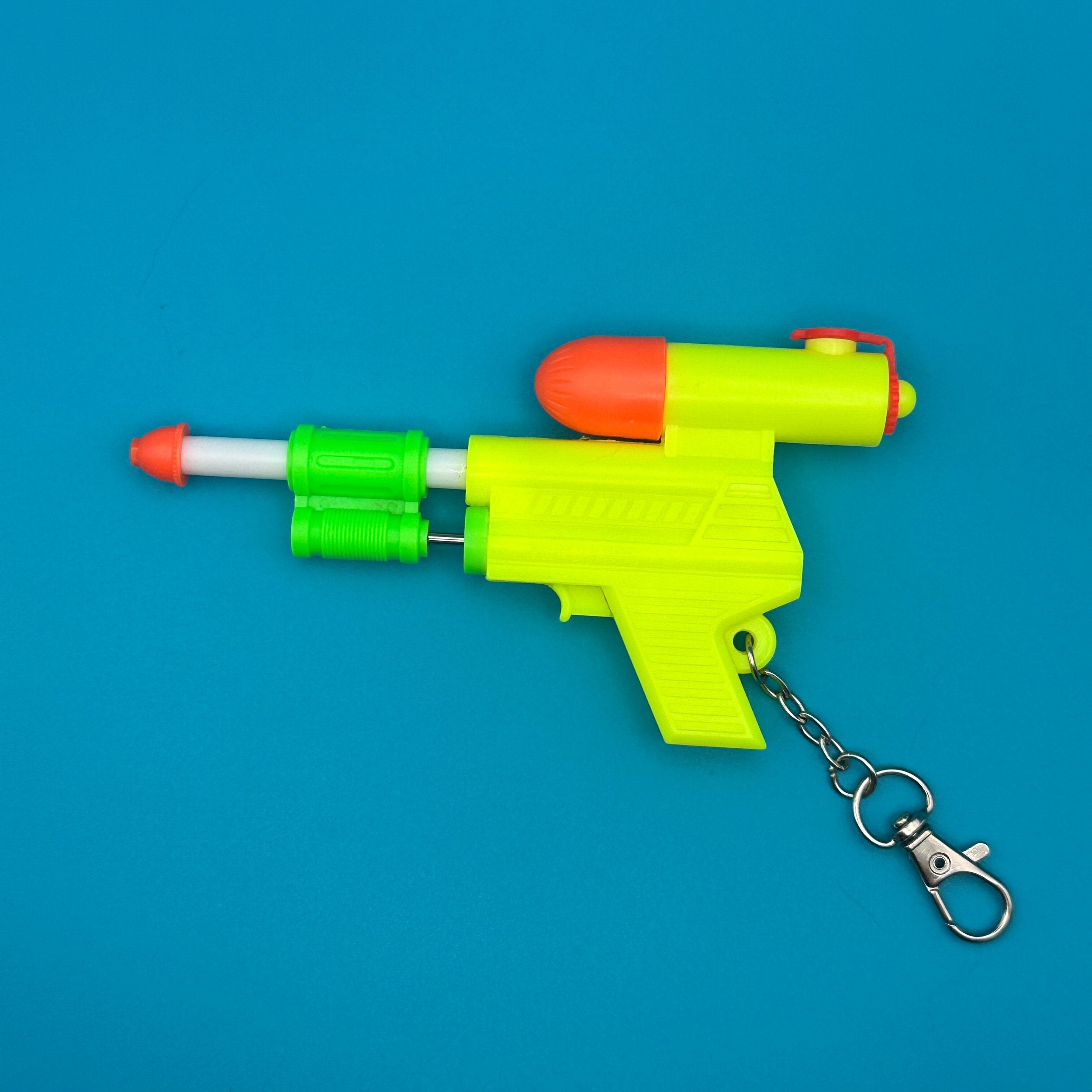 90's Deadstock Neon 'Super Soaker' Squirt Gun    s -  vintage keychain vintage charms for bag nostalgia vintage keychains y2k collectible - Bag Crap