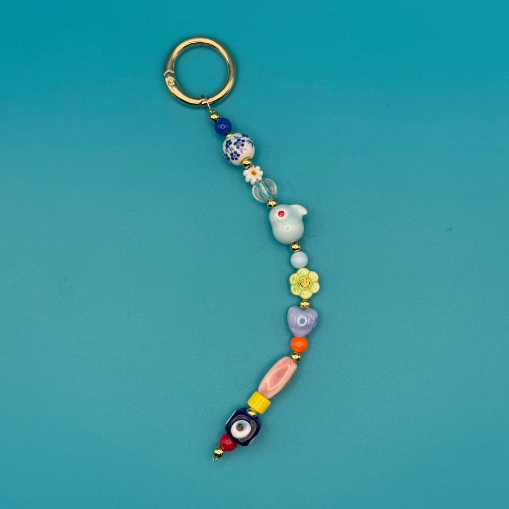 Glass Bead Bag Charm— Evil Eye, Blue Parrot