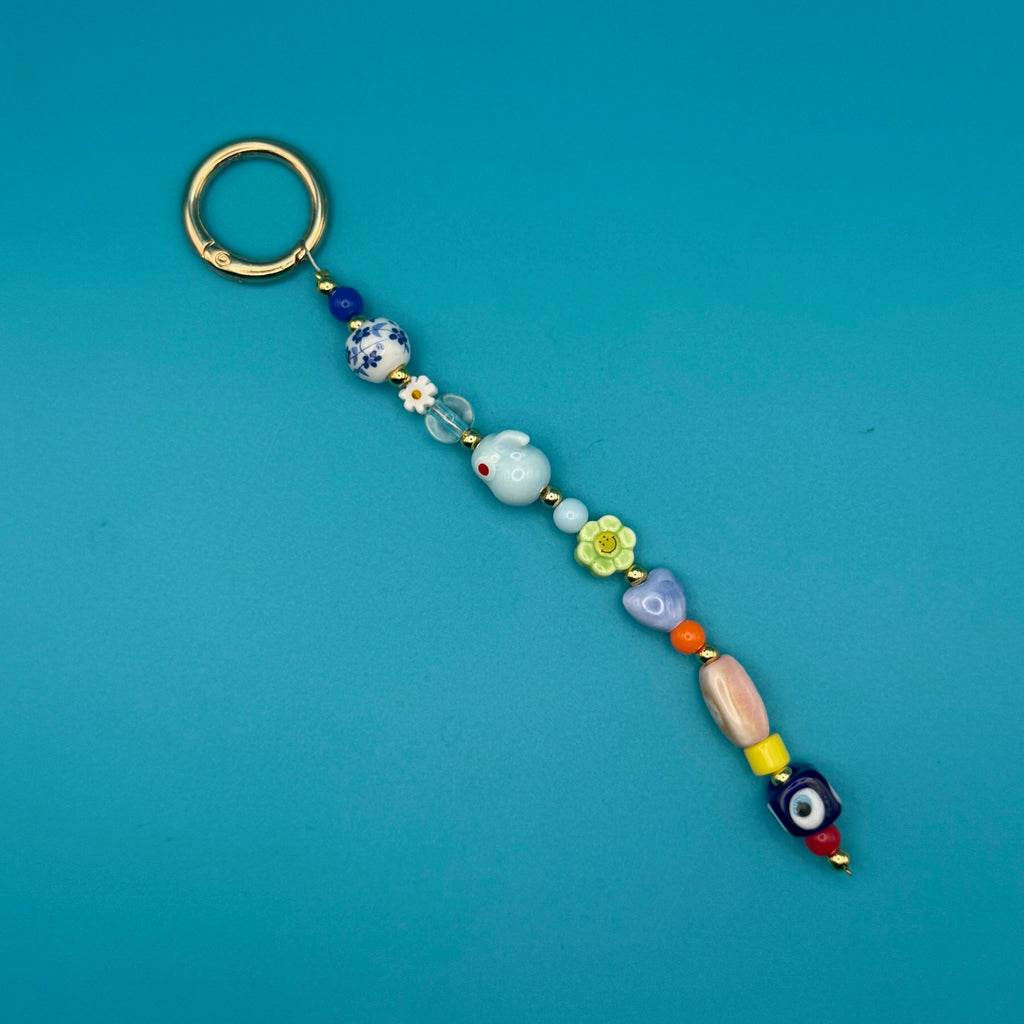Glass Bead Bag Charm— Evil Eye, Blue Parrot