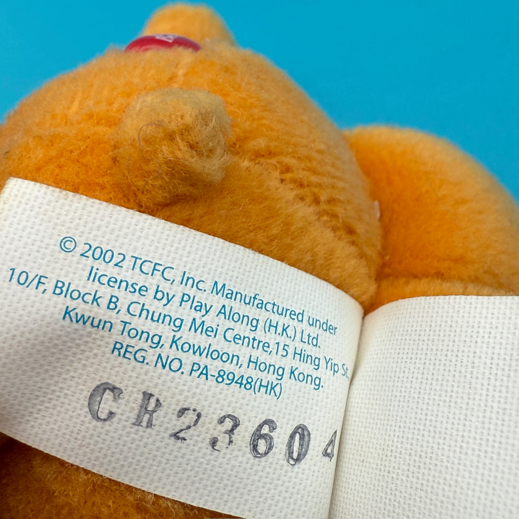 Vintage Y2K Orange 'Tenderheart' Care Bear Plush Bag Charm