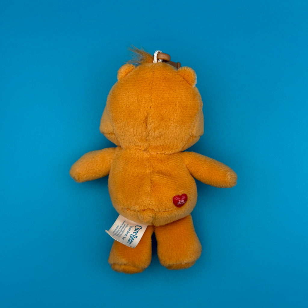 Vintage Y2K Orange 'Tenderheart' Care Bear Plush Bag Charm