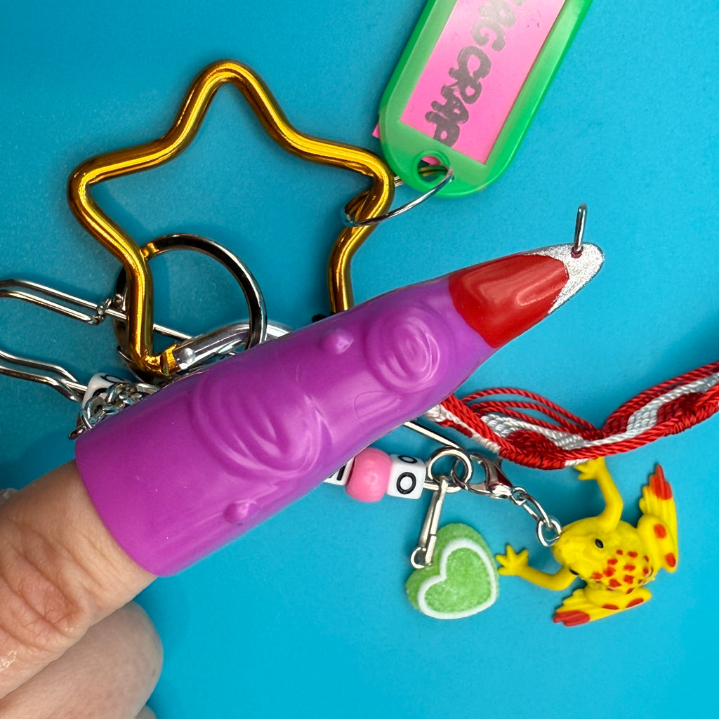 BAG CRAP x COSMOPOLITAN MAGAZINE: Purple Finger Charm Pack