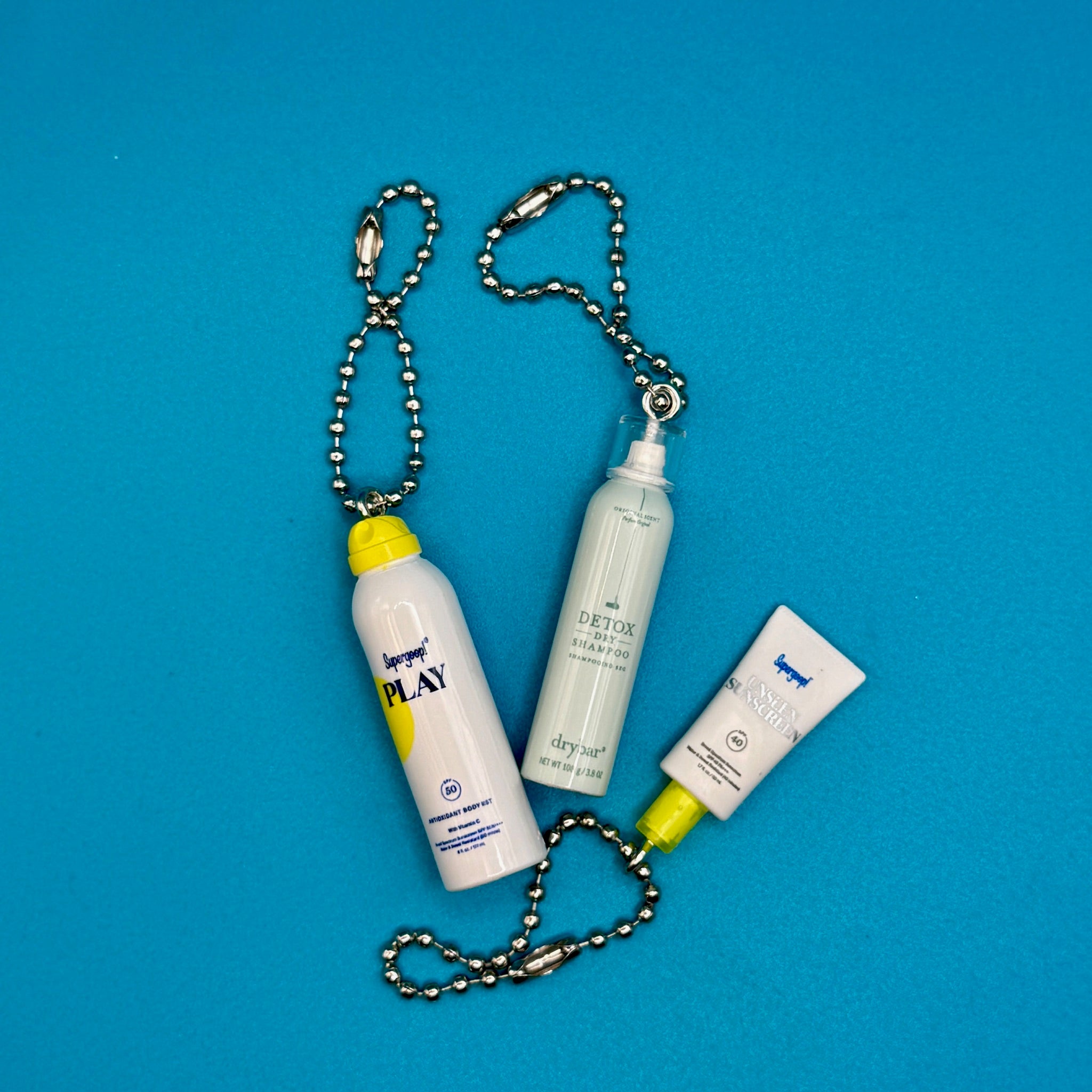 Mini SuperGoop Sunscreen and DryBar  s -  vintage keychain vintage charms for bag nostalgia vintage keychains y2k collectible - Bag Crap