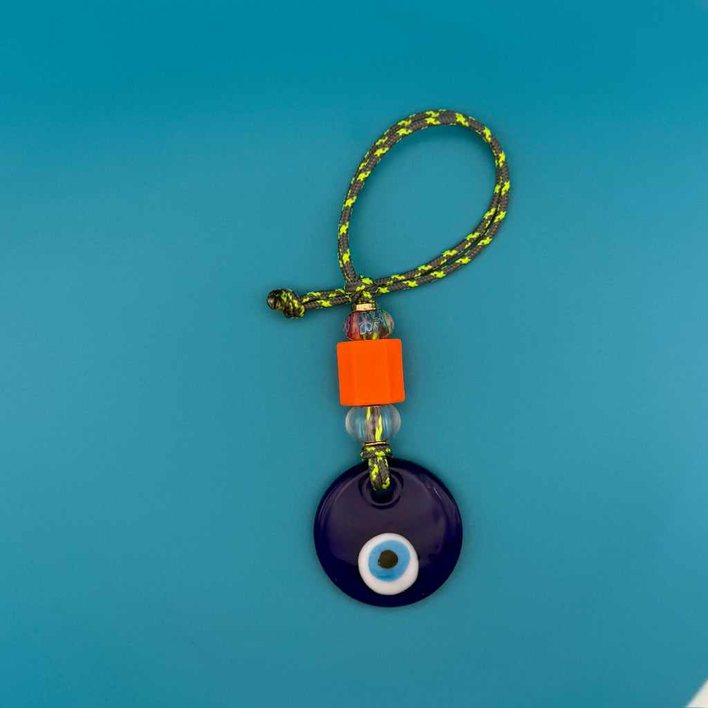 Green Cord Glass Beaded Evil Eye Bag Charm - Orange Bead with Green and Blue Cord - Evil Eye Bag Charm