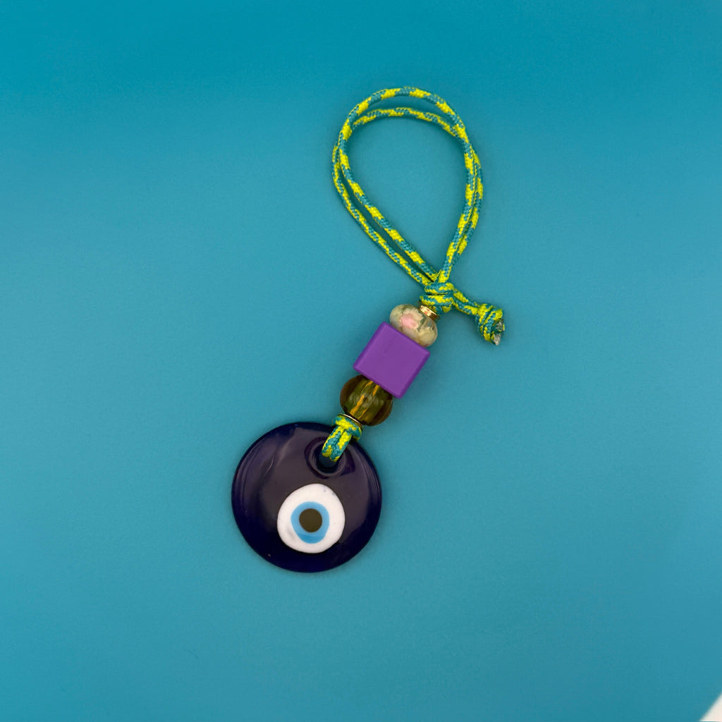Green Cord Glass Beaded Evil Eye Bag Charm - Purple Bead with Green and Blue Cord - Evil Eye Bag Charm