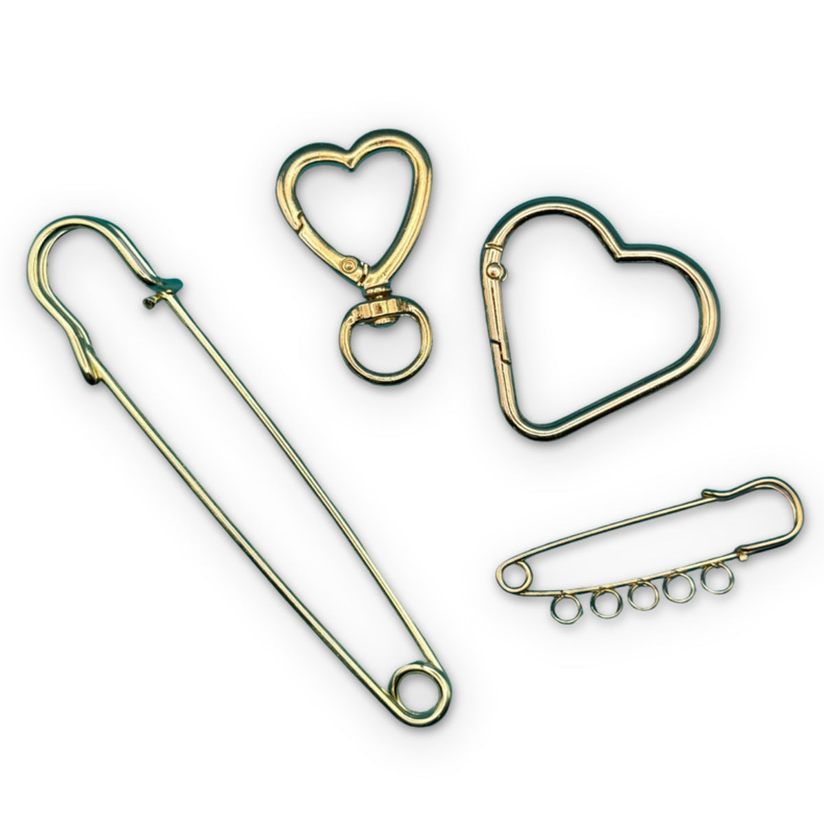 4 Piece Gold Bag Charm Clip & Pin Set on a white background