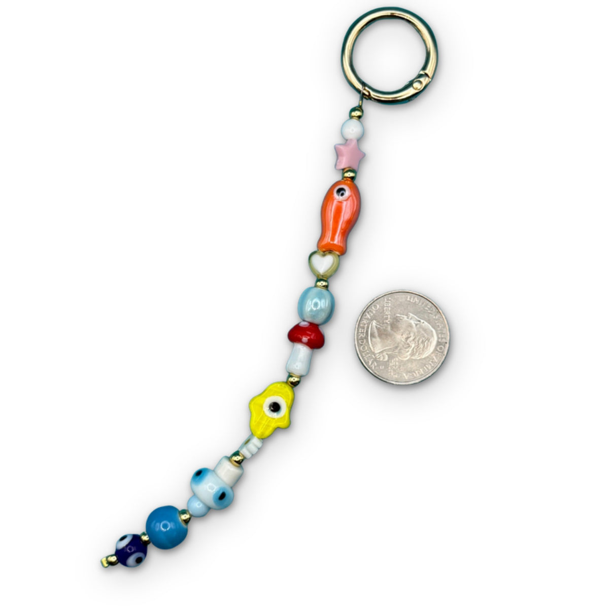 Colorful Glass Beaded Bag Charm on a white background