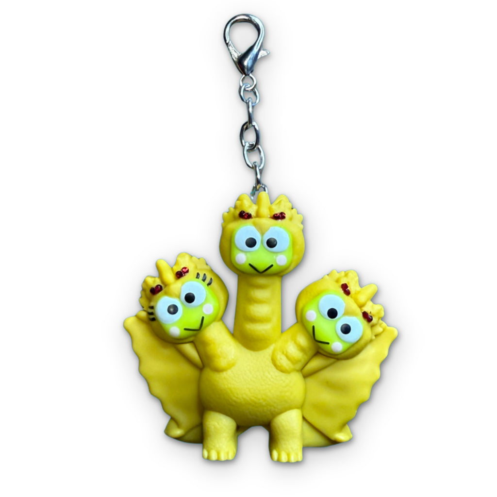 Full Character Set: 8 Hello Kitty x Godzilla Happy Meal Bag Charms
