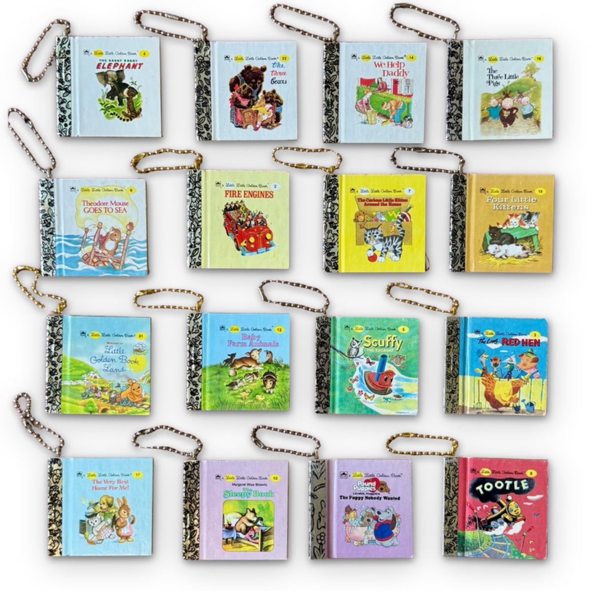 Mystery Blind Box: Vintage Little Golden Book Bag Charm Keychains on a white background