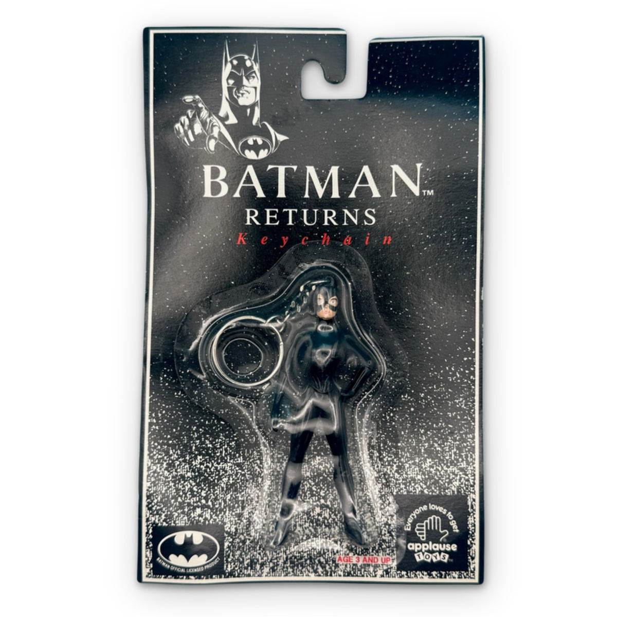 NIP 1992 Vintage Keychain: Batman Returns - Catwoman Keychain on a white background