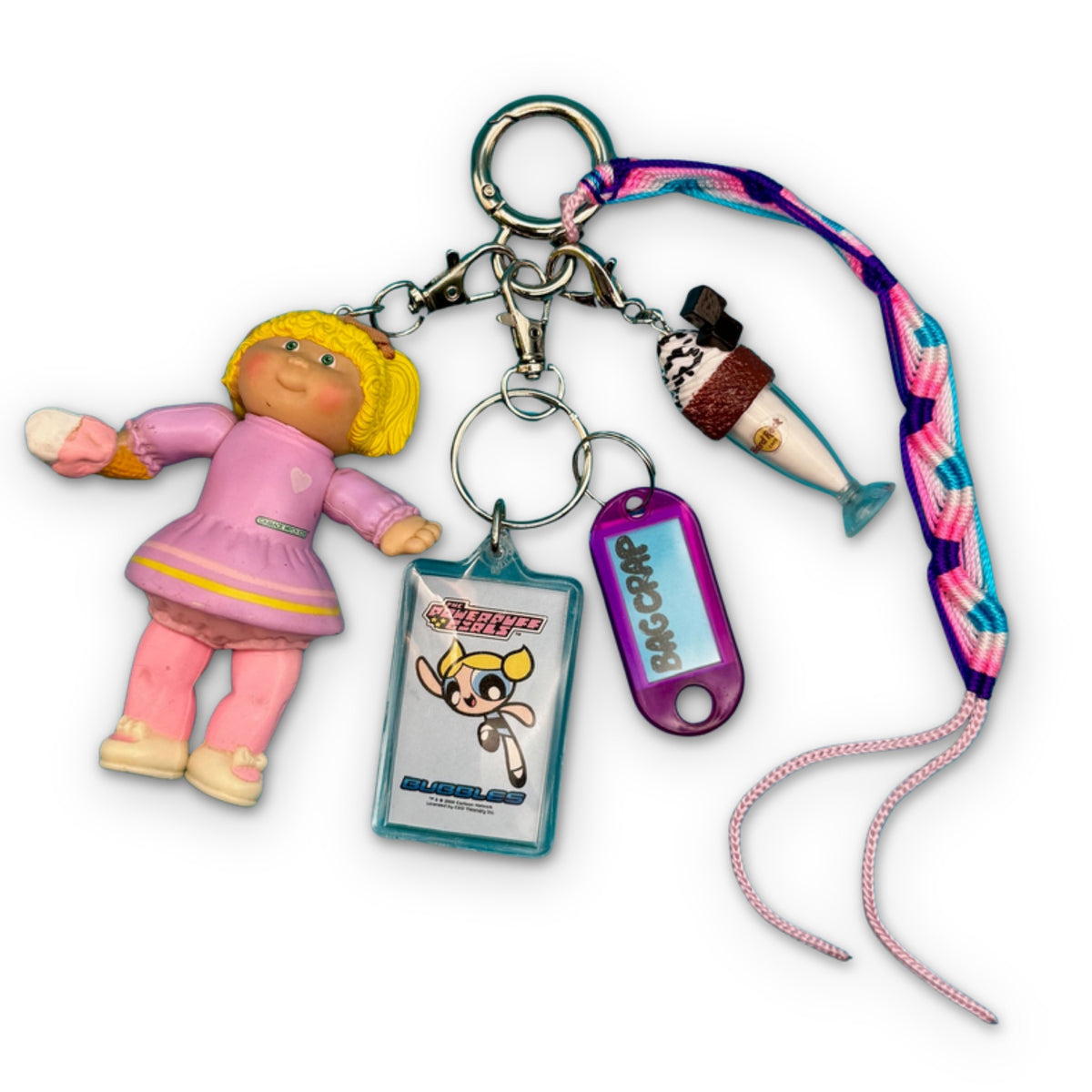 One-of-One 1980's Vintage Keychain Bag Charm Pack - Cabbage Patch Doll, Powerpuff Girls on a white background