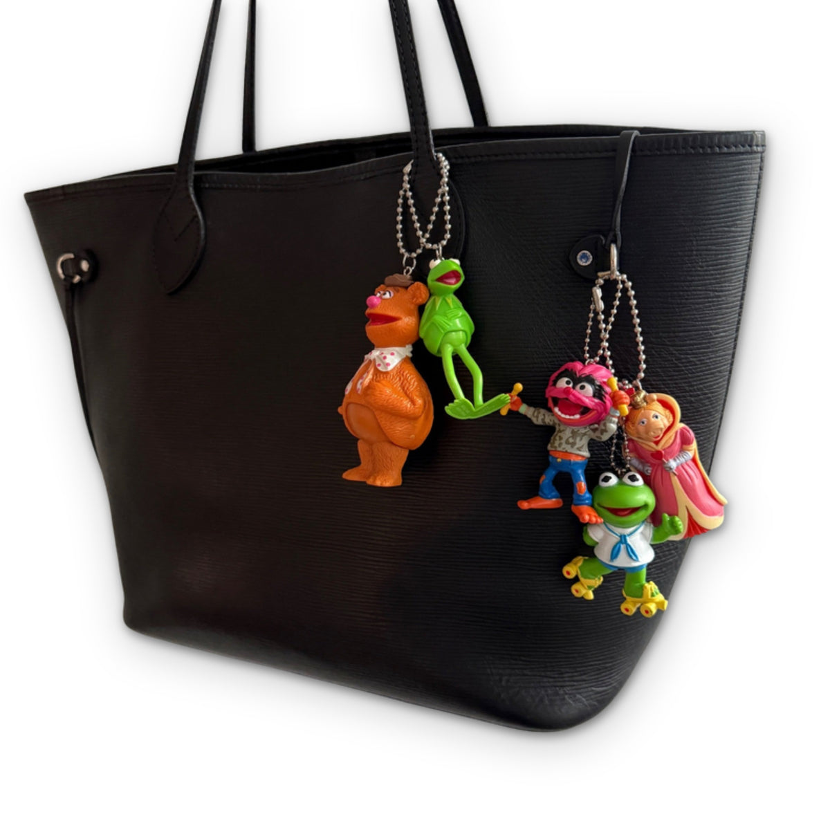 Vintage 1980s Muppet Bag Charms styled on a bag, on a white background
