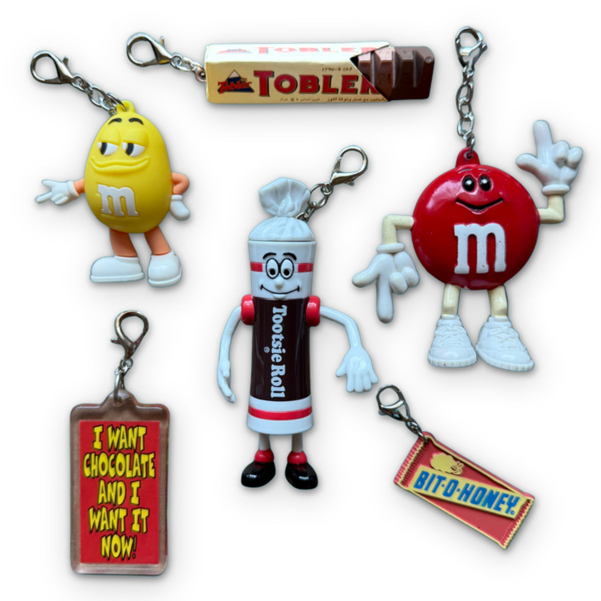 Vintage Candy Keychains & Bag Charms: Tootsie Roll, M&M on a white background