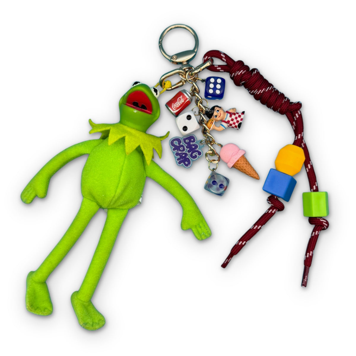 Vintage Kermit the Frog plush bag charm set designed by Bag Crap with gold hardware, a mini Big Boy and Coca-Cola soda, on a white background