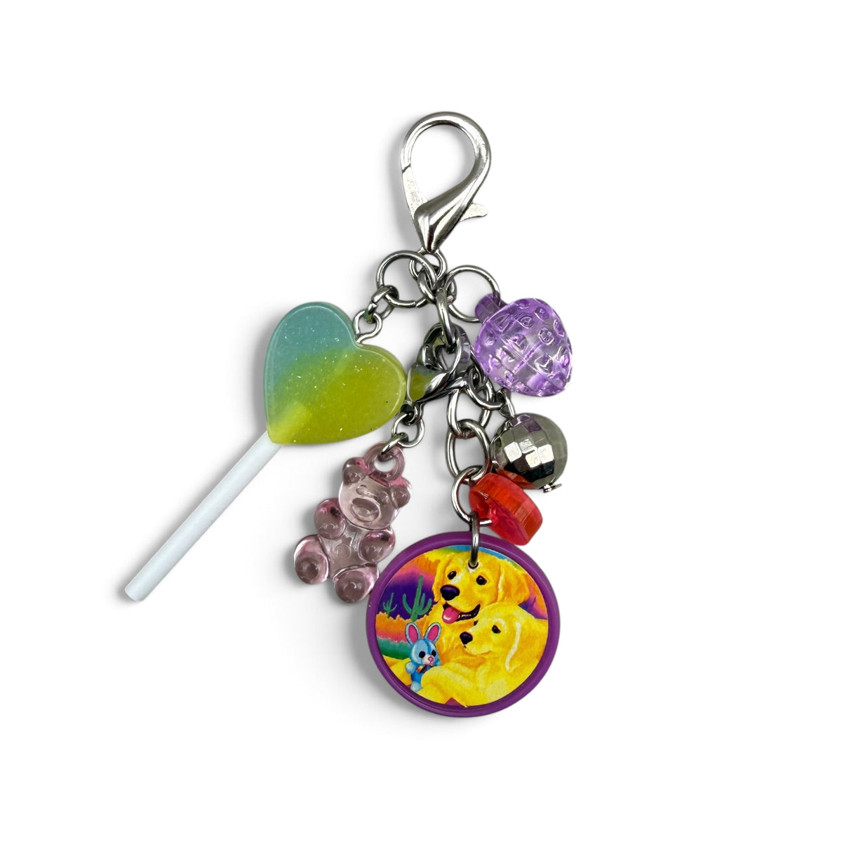 Vintage Lisa Frank golden retriever bag charm with heart lollipop, gummy bear and purple puppy disc