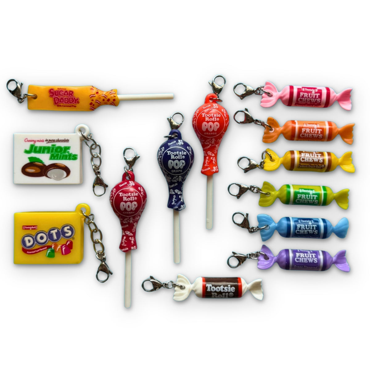 Bag Crap Vintage Tootsie Roll and Tootsie Pop Candy Keychain Charms on a white background