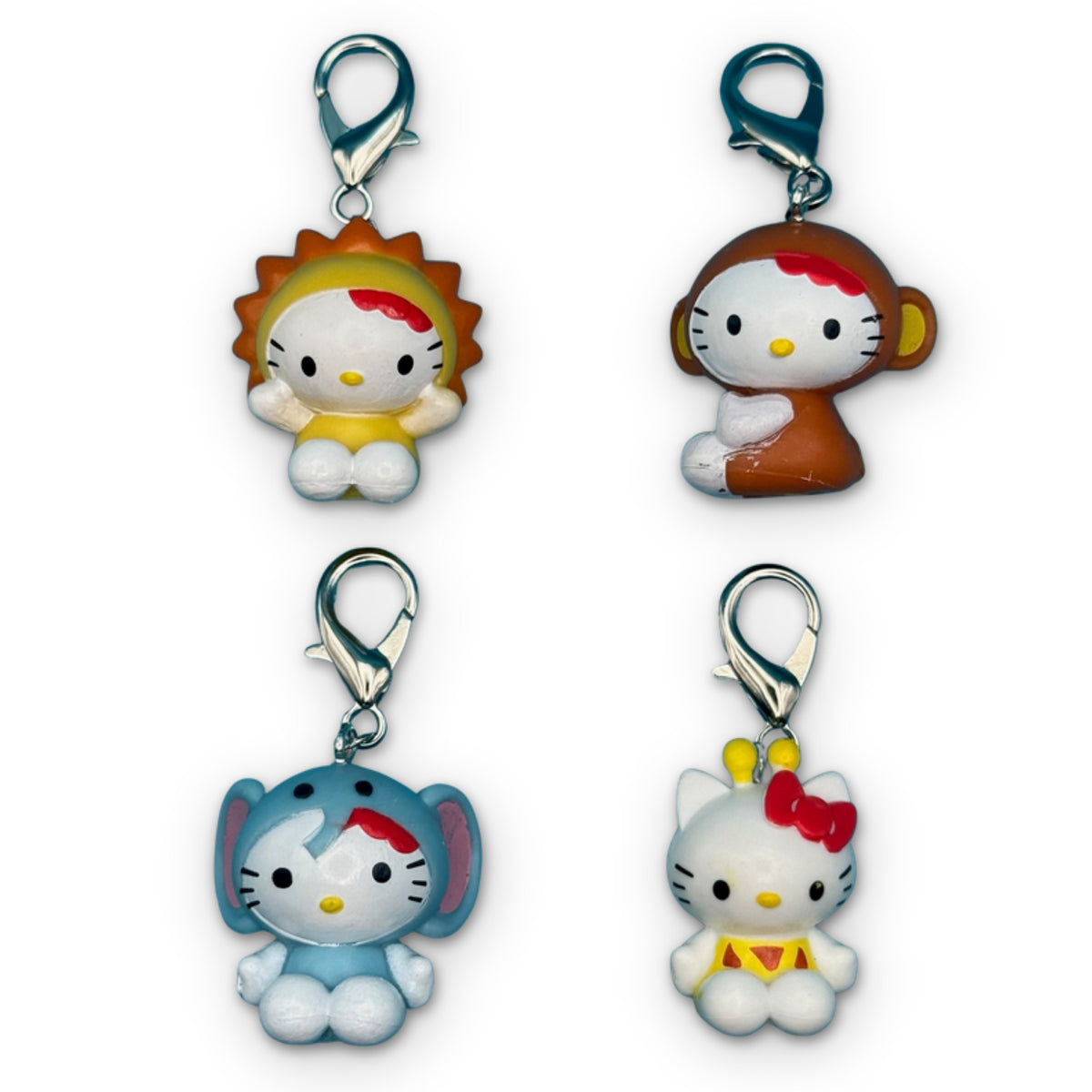 Vintage Y2K Hello Kitty Mini Animal Costume Charms on a white background