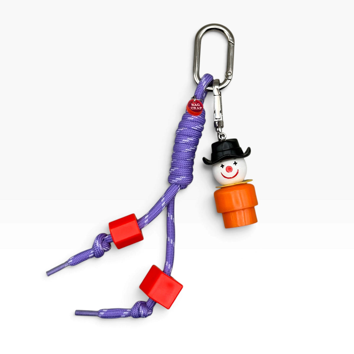 Vintage Fisher-Price Little Person clown with purple paracord bag charm
